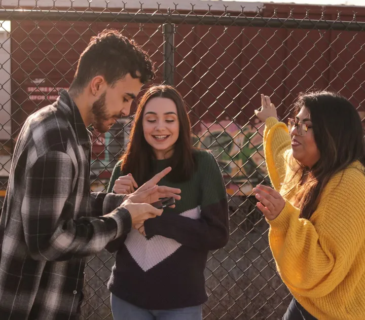 Young people spending time together outdoors.